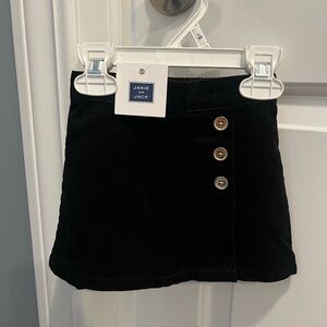 New Janie and Jack black skirt with gold buttons for babies 3-6 months old.